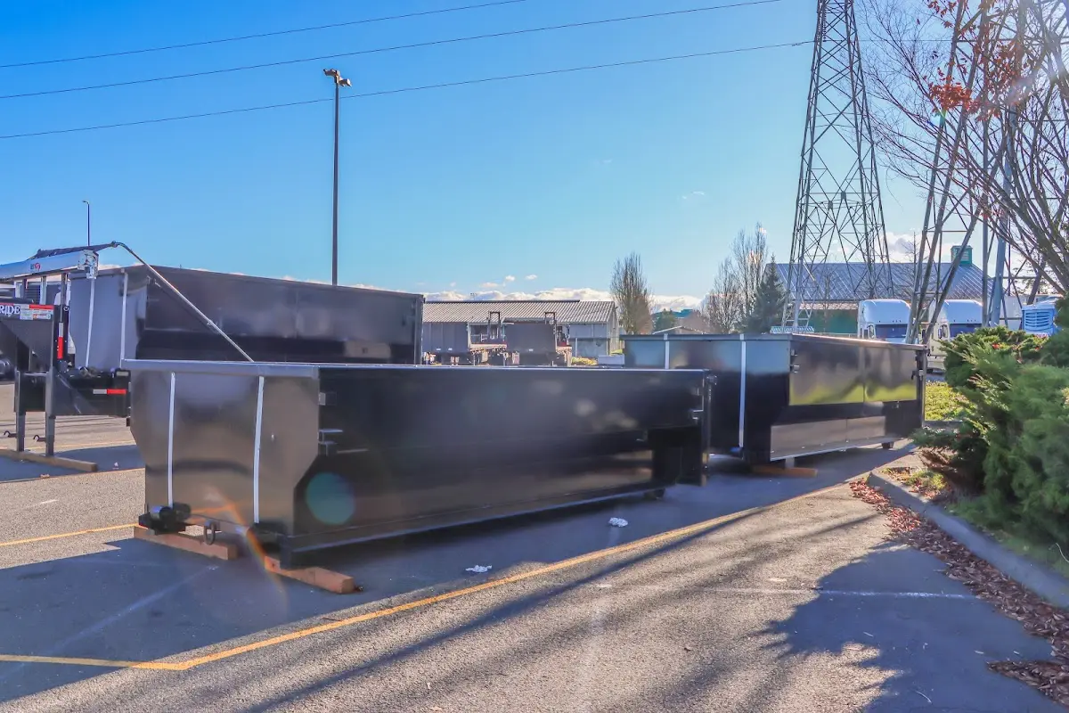Roll-off dumpster ready for waste disposal at job site for 2 Yard Dumpster Rental in Longmeadow